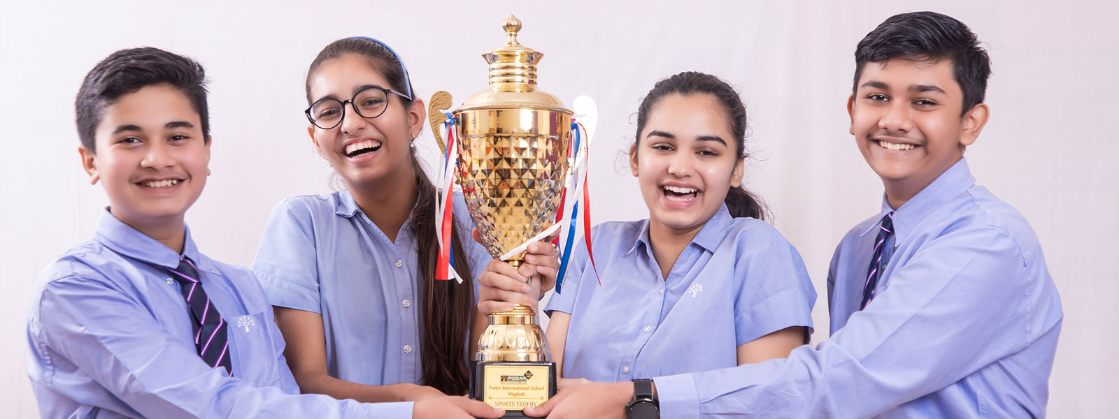 students participating in cultural events at podar education school